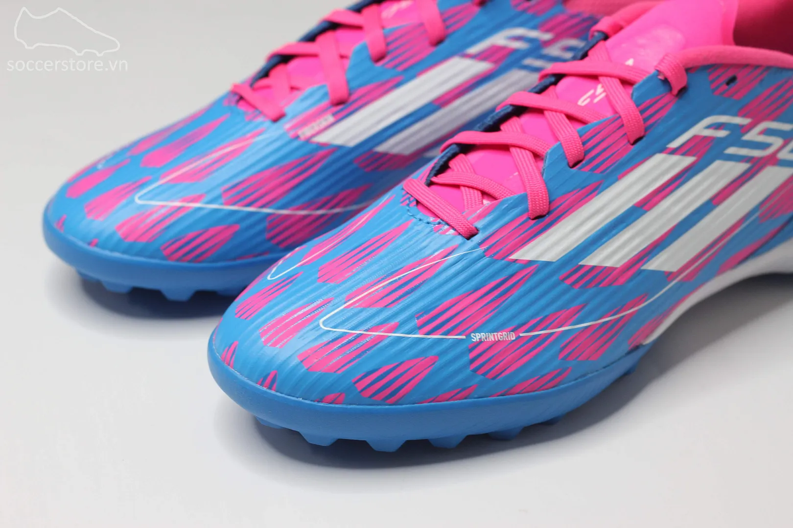 Adidas F50 League TF Reemergence pack màu hồng trắng IF1336